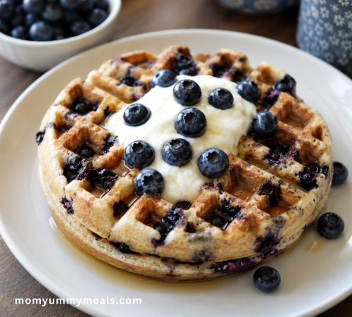 Fluffy blueberry high protein waffles made with Greek yogurt and fresh blueberries