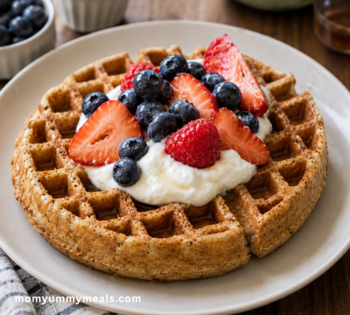 Easy cottage cheese high protein waffles topped with berries and Greek yogurt