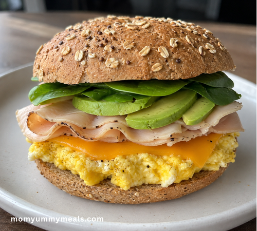 High protein egg breakfast sandwich with turkey avocado spinach and cheese