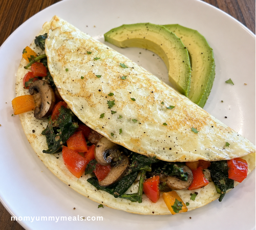 egg white omelet filled with spinach mushrooms and bell peppers