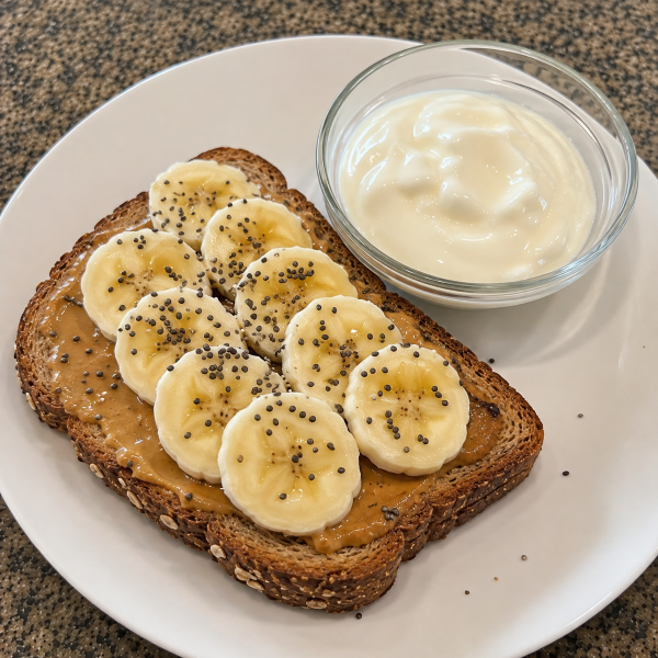 Whole grain peanut butter banana toast with chia seeds and Greek yogurt