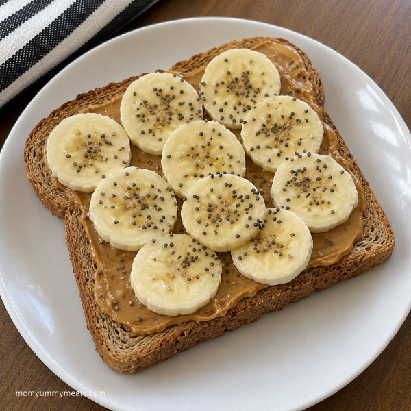 Whole grain toast with peanut butter banana slices and chia seeds